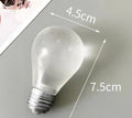 Glow In the Dark Light Bulb Squishy