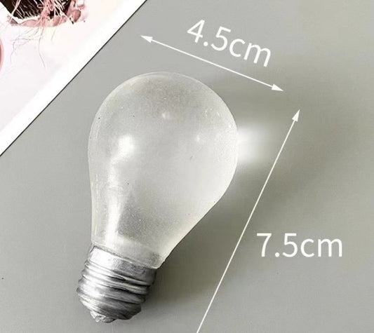 Glow In the Dark Light Bulb Squishy - shipping estimate 6/28