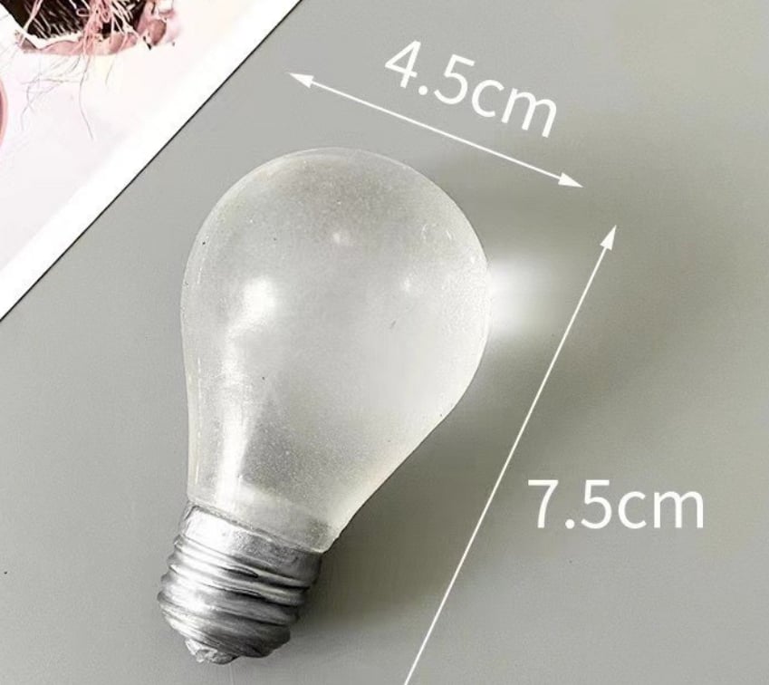 Glow In the Dark Light Bulb Squishy